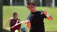Alexander Shevchenko hits a forehand